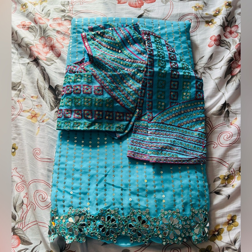 Vibrant Indian blue and Red Embellished Saree